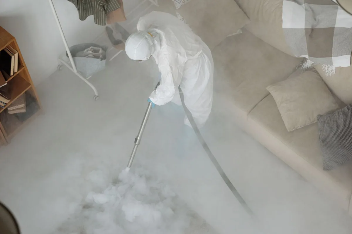 Biohazard cleanup technician in protective equipment, Morningside Heights, New York, NY